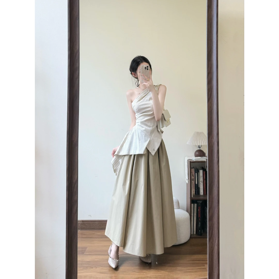 INS CEC高级感不规则纯欲性感斜肩条纹吊带上衣女高腰A字伞裙套装