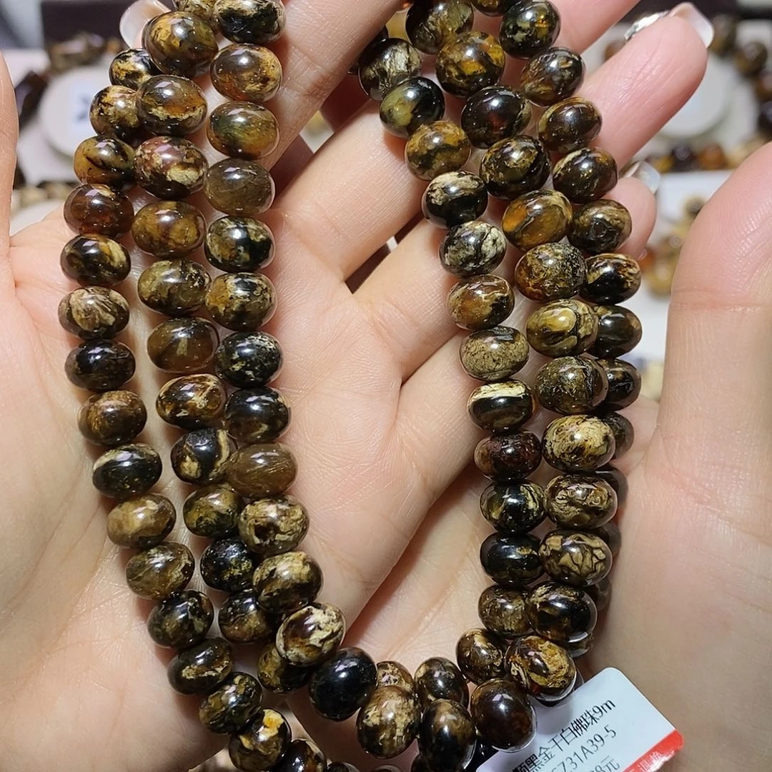 大***边琥珀未镶嵌裸石熊猫花9+