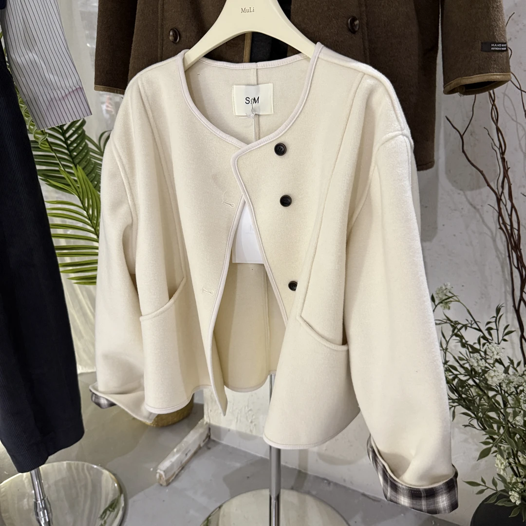 十三行2025秋冬新款设计感拼接袖口格子新款时尚洋气百搭女装