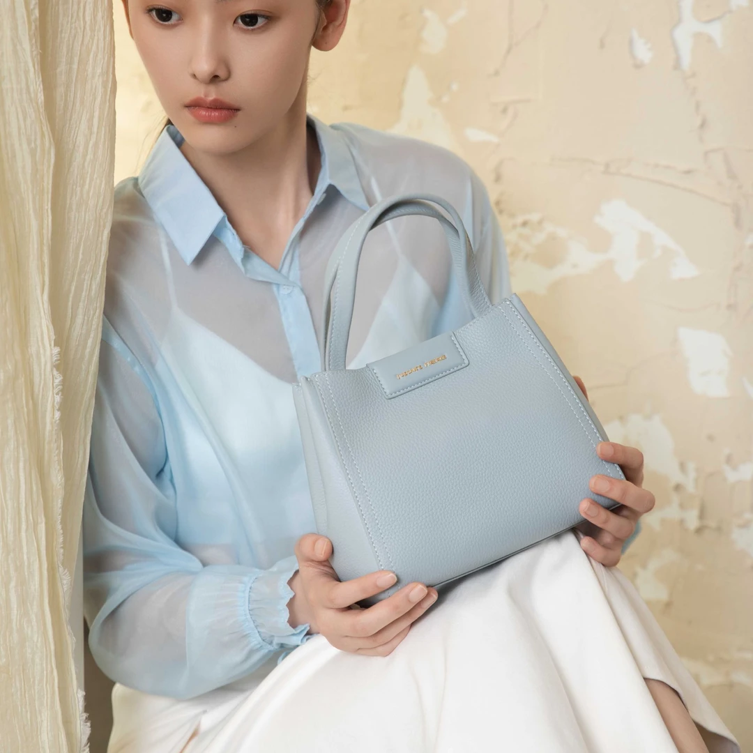 经典百搭小众菜篮子手提包高级质感真皮时代集团包包时代集团