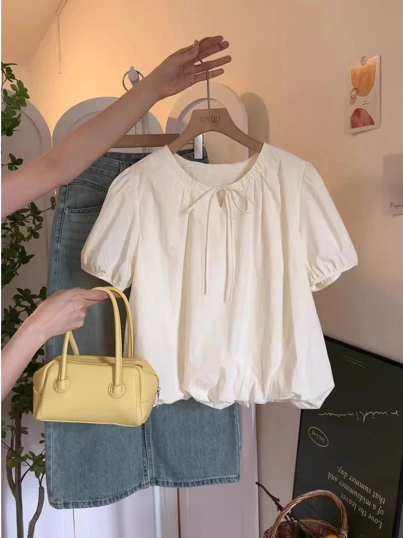 米白色镂空系带泡泡袖花苞衬衫女2025新款夏季法式独特超好看上衣