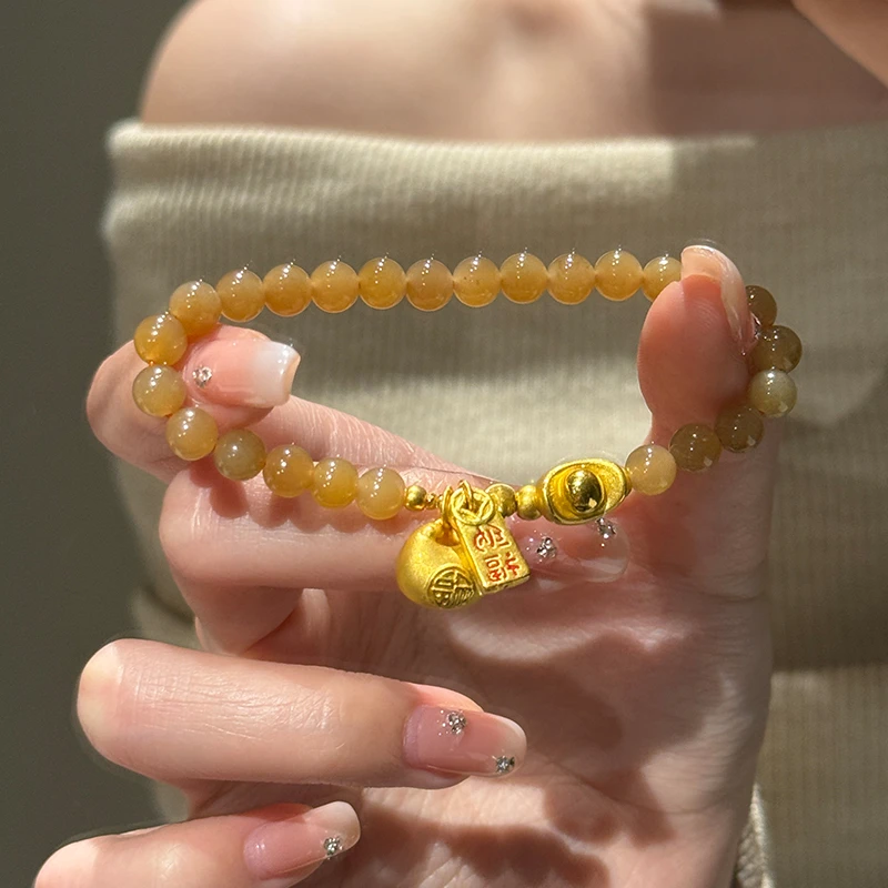 海上罗孚黄金小胖福元宝糖色珠手链女新款999足金招财手串送女友