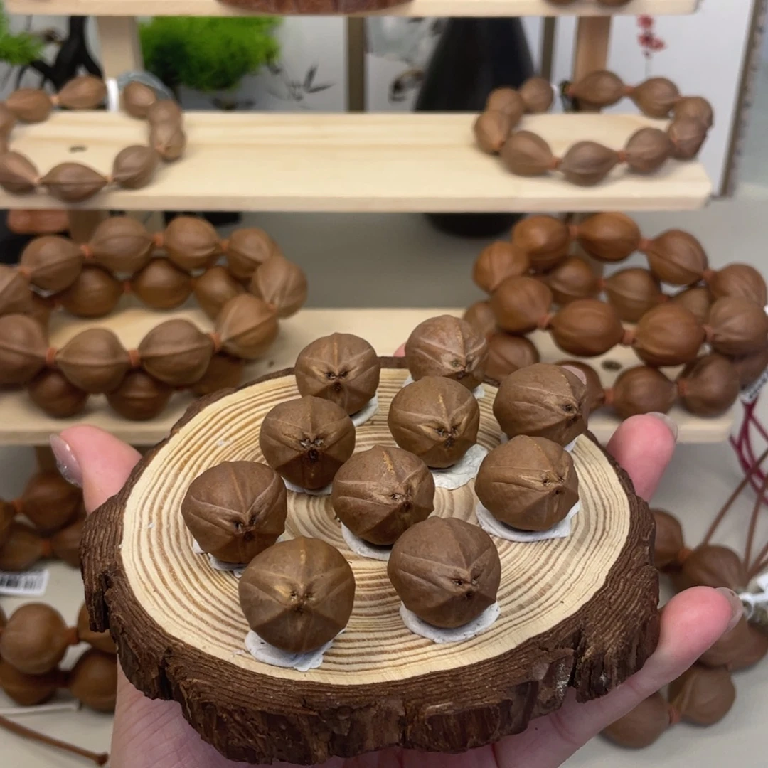 谈***心橄榄核手串/手链20*27梅林铁核