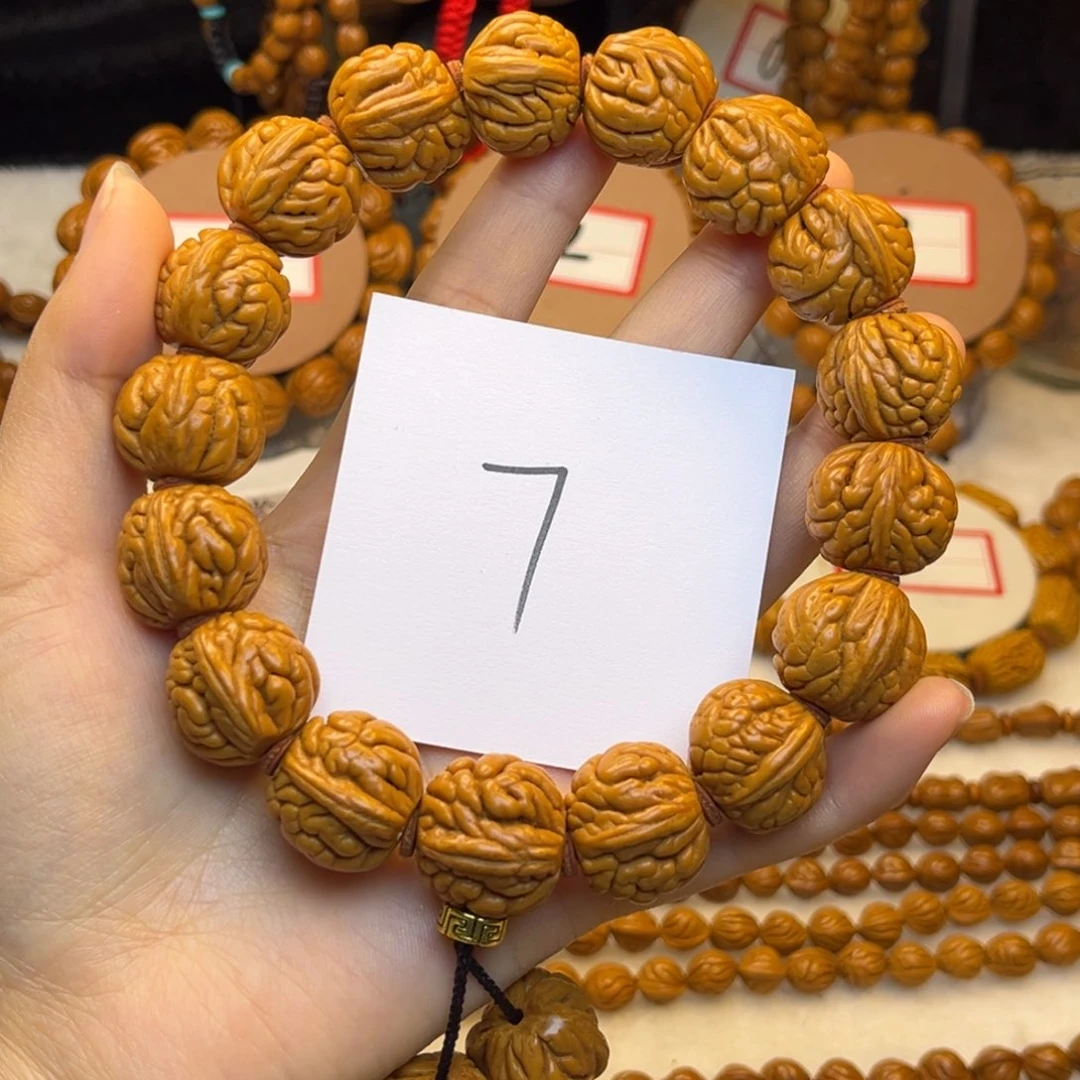 核桃龙纹桃核手持肚卡19霸王龙