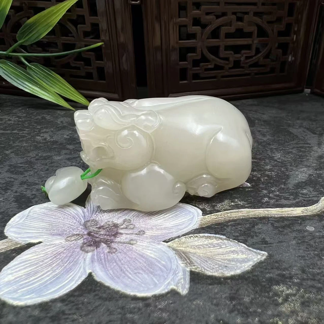 A135 和田玉手把件 LZ634102571