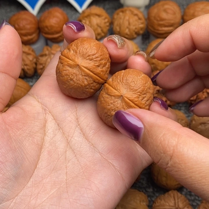 文玩核桃把件壮**?元宝