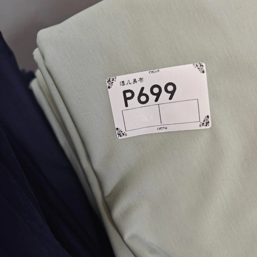 699绿色海藻雀眼布料