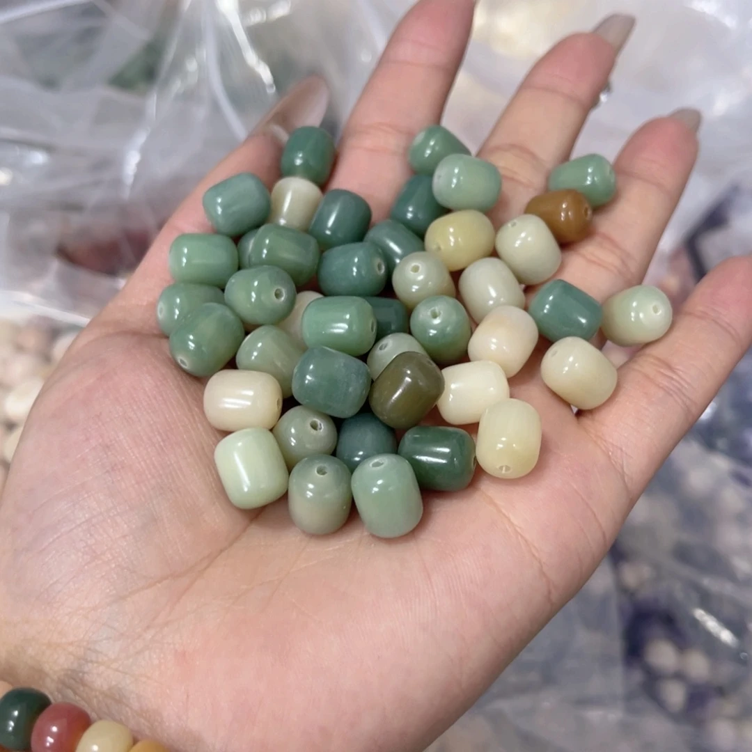 白玉菩提吊坠a12mm50颗。年糕