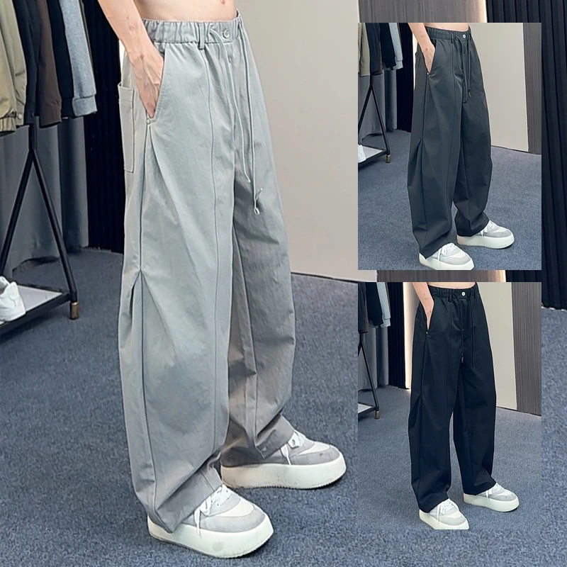 春秋立体剪裁弯刀直筒休闲裤裤子男士时尚潮流宽松痞帅百搭休闲裤
