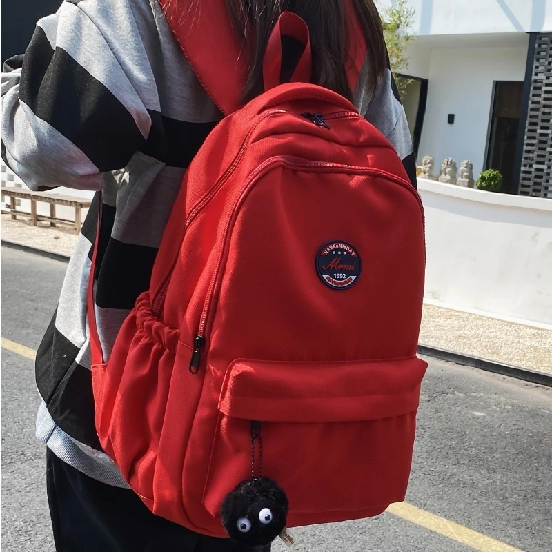 书包女生大学生高颜值电脑背包韩版红色高中生初中生旅行双肩包男
