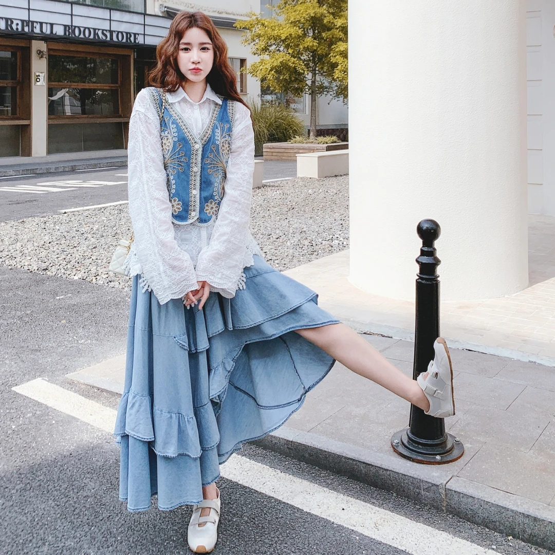 设计感洋气减龄套装裙女早秋新款灵动衬衫马甲不规则半身裙三件套