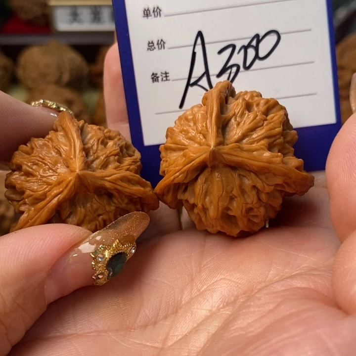 九***屋把件桃核三棱三棱