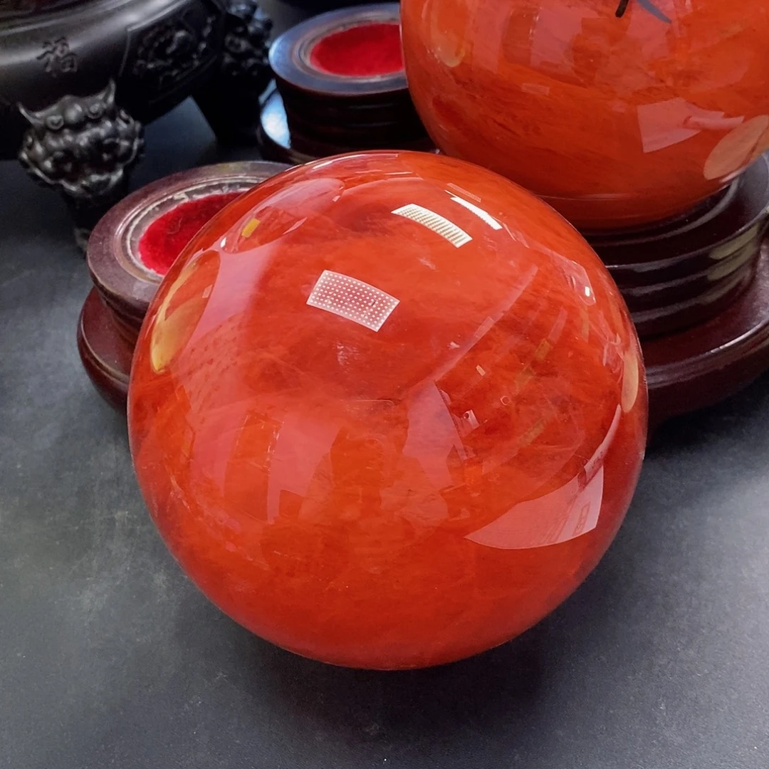 阳***G石材11厘米红水摆件