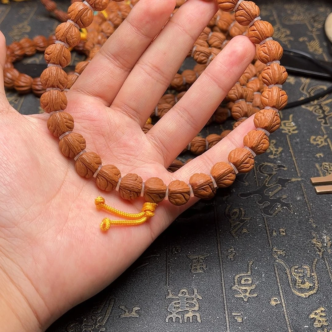 桃核吊坠玉龙手持