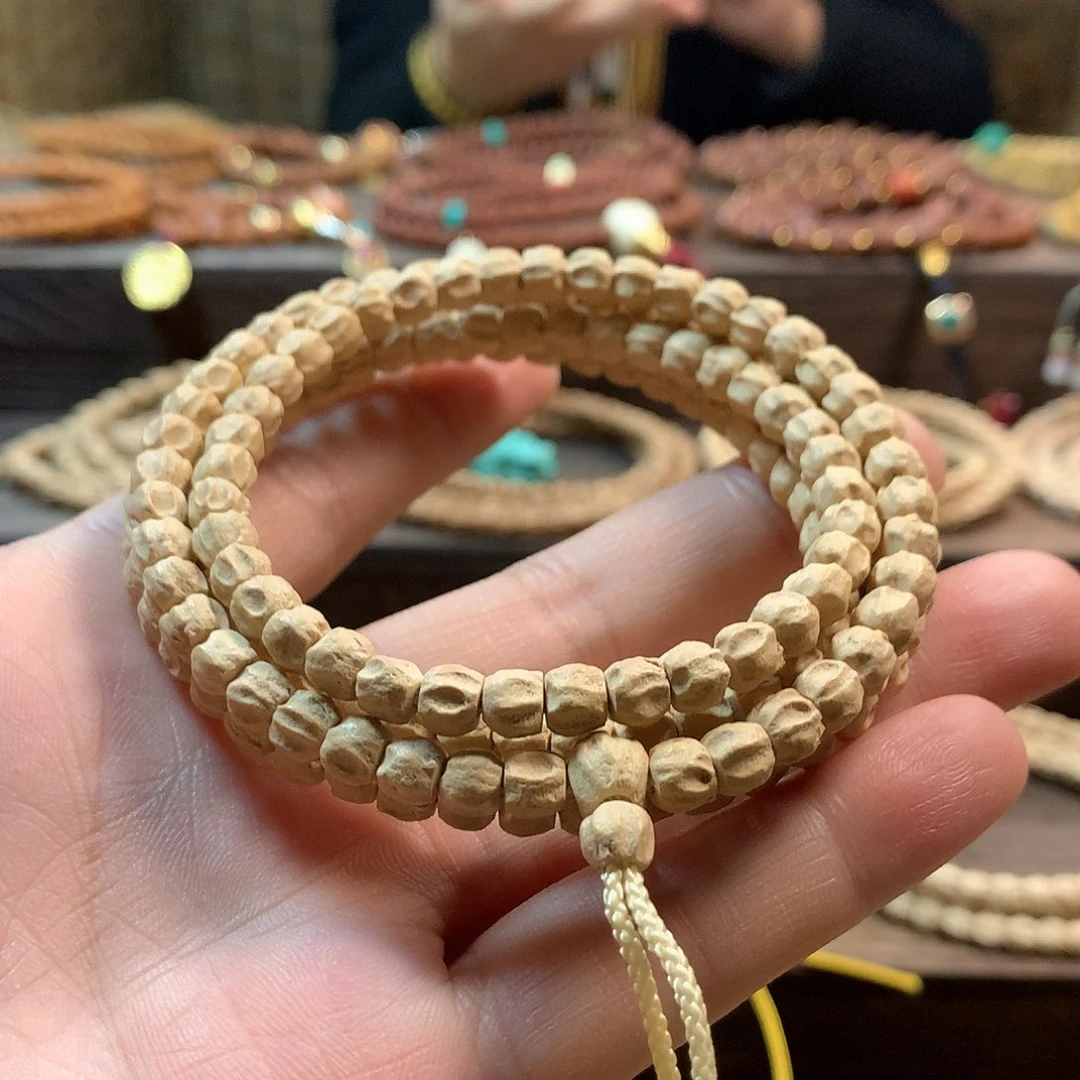 柏香籽/百香籽吊坠粉皮方块单眼双坑