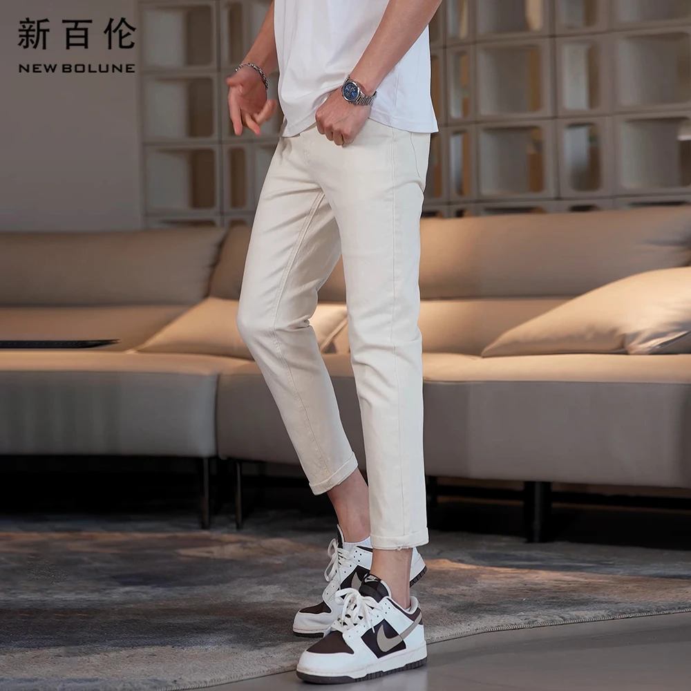 新百伦秋冬香槟色爆款男士牛仔裤2025新款修身小直筒九分男款裤子