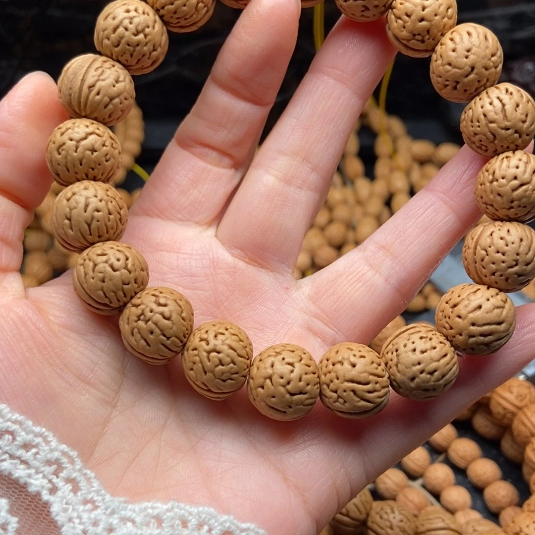 阿***活桃核手串肌肉纹金丹15左右