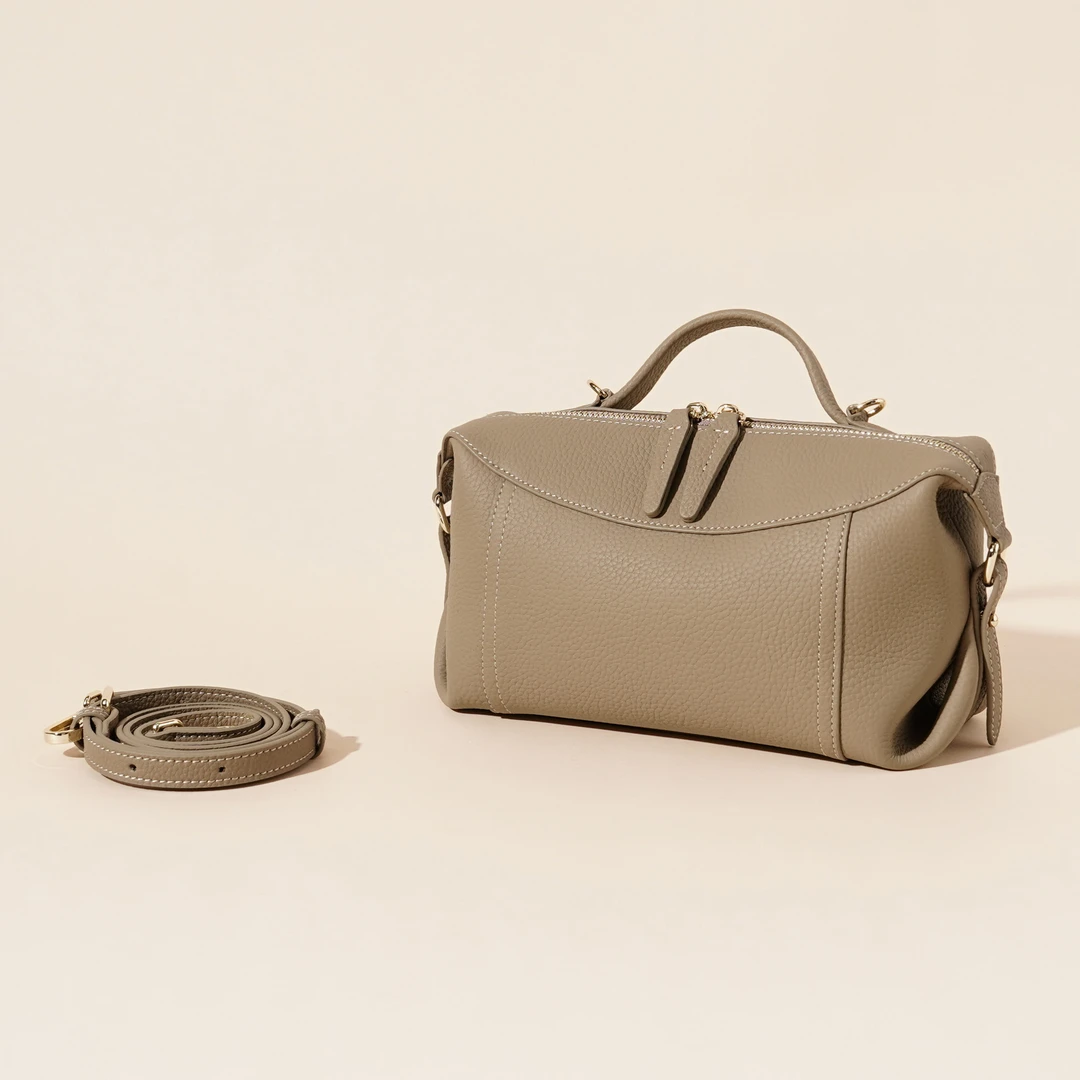 岩牛夏季新款时尚百搭女士真皮小众单肩斜跨包YN3567