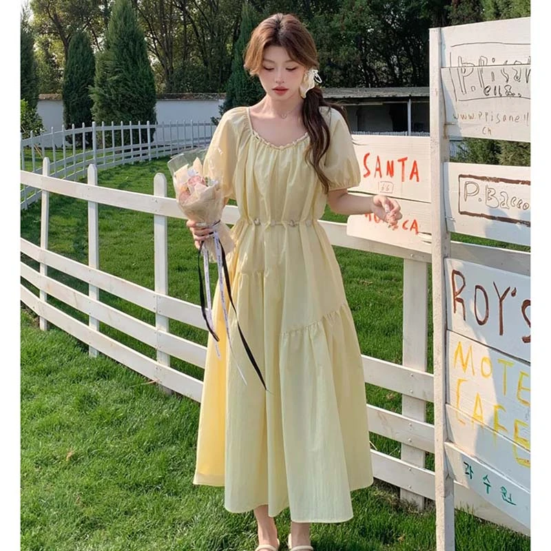 法式泡泡袖奶黄色连衣裙女夏2025新款长裙高级感D1959
