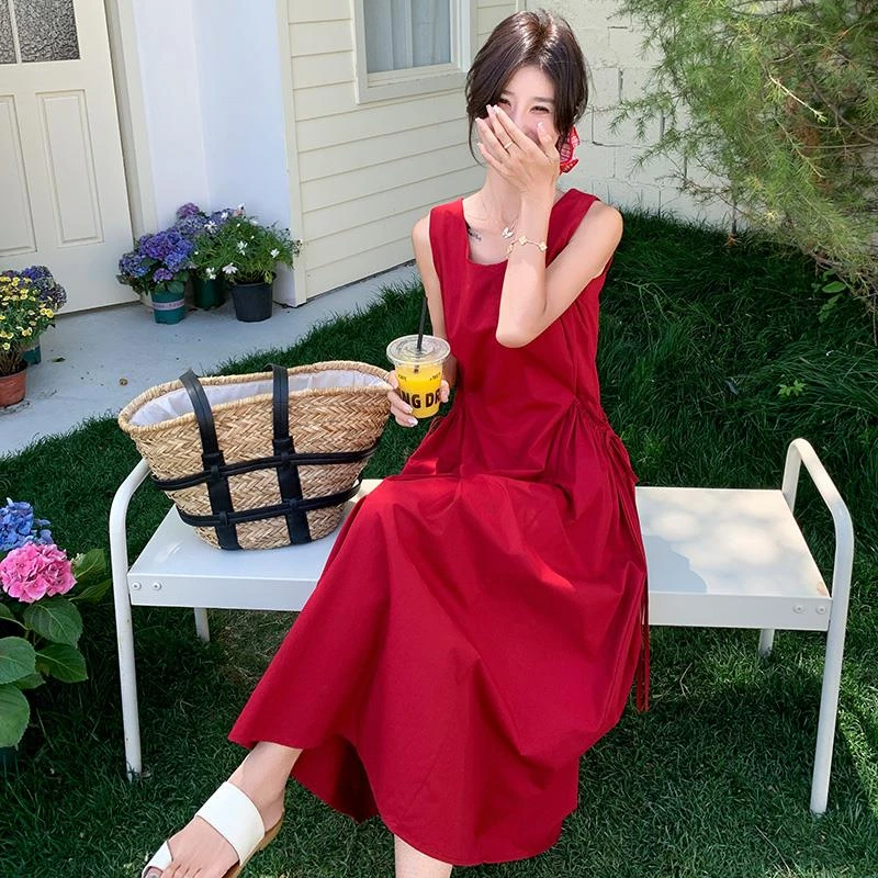 明艳动人设计感红色无袖连衣裙女2025夏季时尚双口袋气质收腰长裙