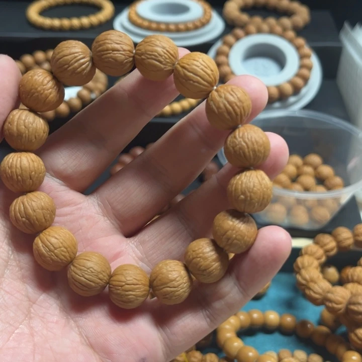 猴头核桃手串凤羽原皮原色