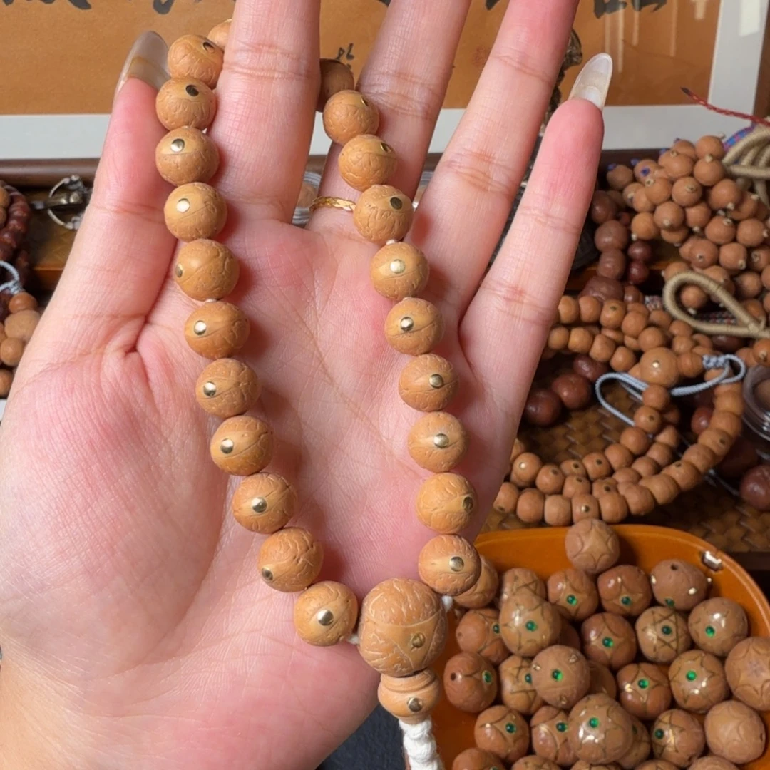 凤眼菩提把件11mm 铜钉镶嵌