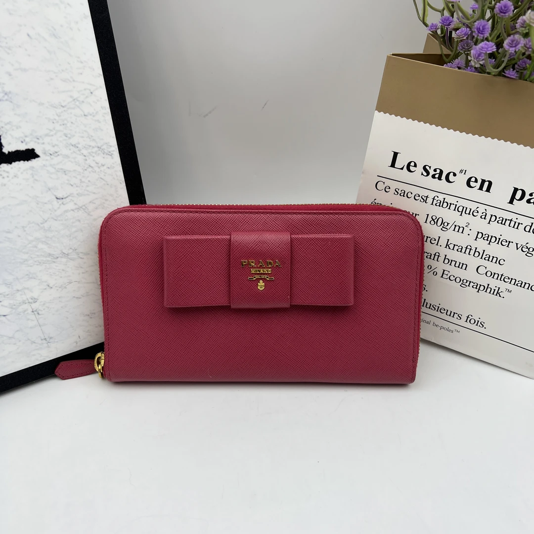 95新 Prada/普拉达 8301/玫粉蝴蝶结拉链长款钱包