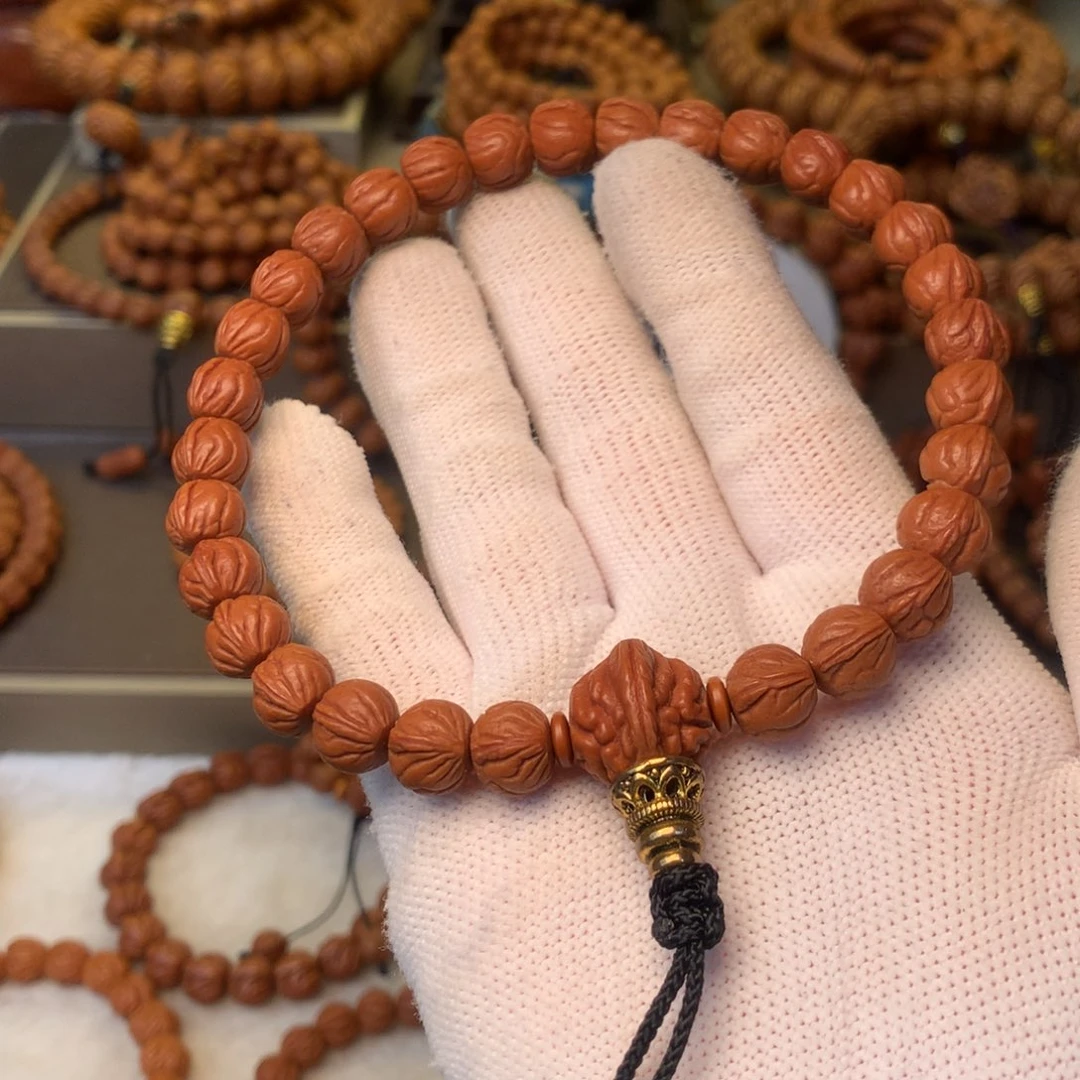 火***洋手串桃核秦岭龙纹