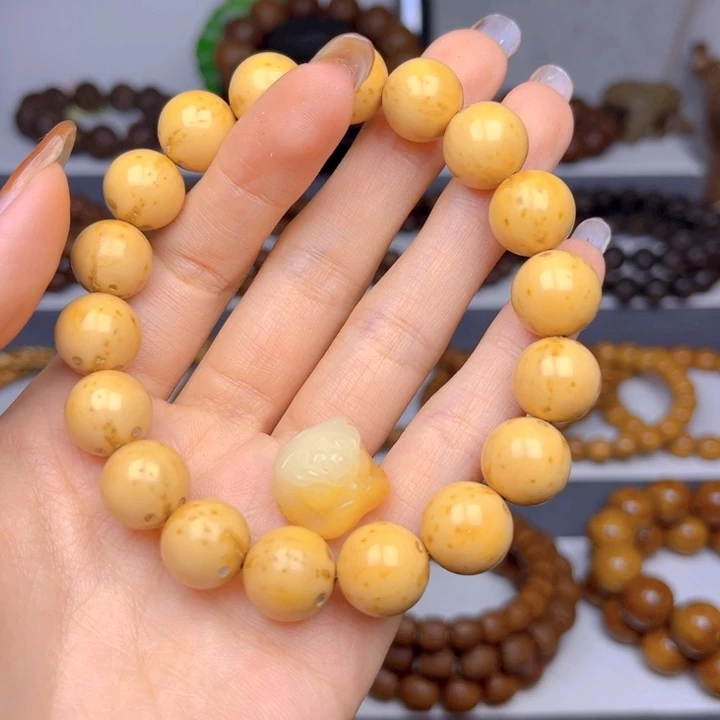 流***星手串紫金鼠光珠差价