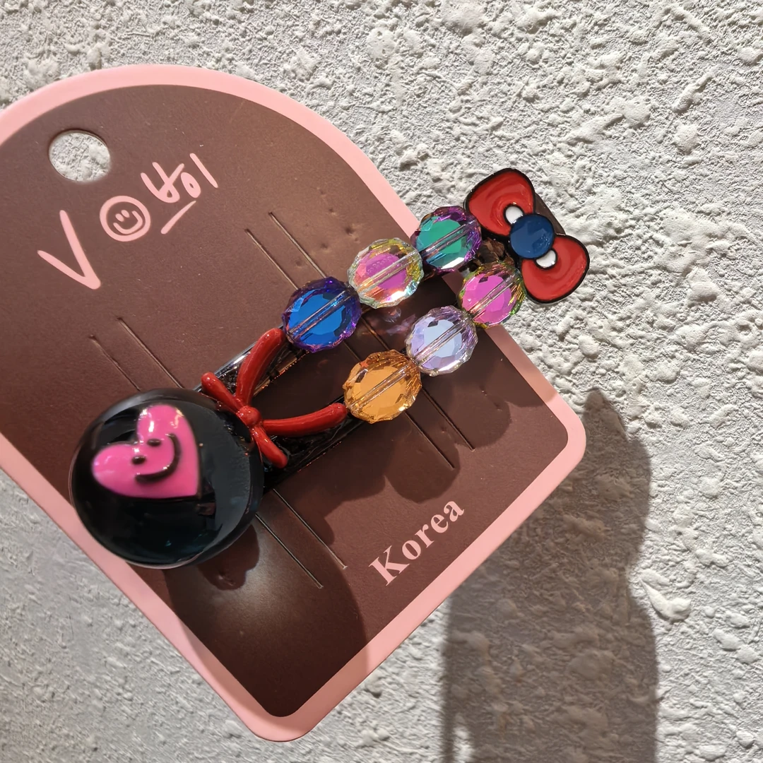 A008蓝色冰透球蝴蝶结闪闪边夹