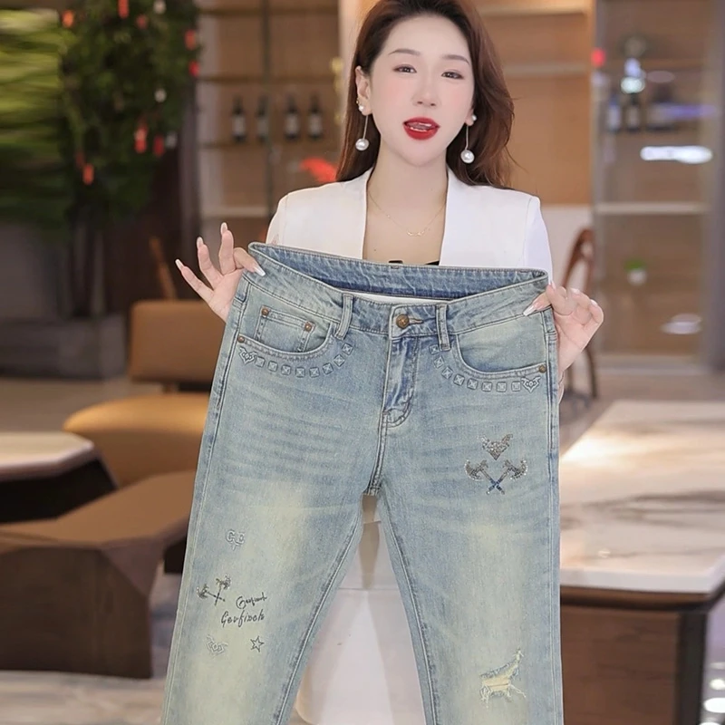 夏季薄款新款轻奢清爽蓝烫钻破洞男士修身牛仔裤时尚潮流百搭潮牌