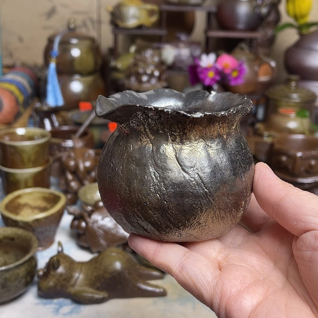 手捏钱袋子公道分茶器