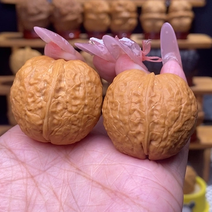 文玩核桃把件橄榄球55号