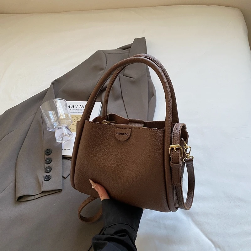 高级感上班手拎水桶包2025春季新款时尚简约百搭单肩包休闲斜挎包