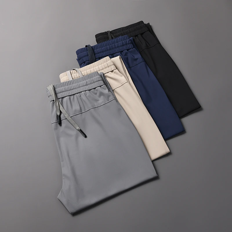 TUCANO/啄木鳥男士夏季冰丝薄款休闲弹力休闲裤修身直筒潮流运动