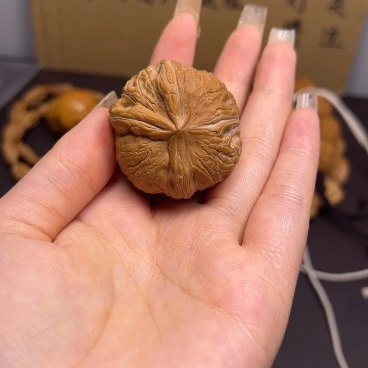 飞***觉桃核吊坠元宝单只异型有瑕