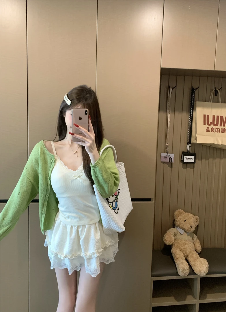 韩系镂空长袖针织衫2025秋季新款休闲显瘦短款设计感简约上衣女潮