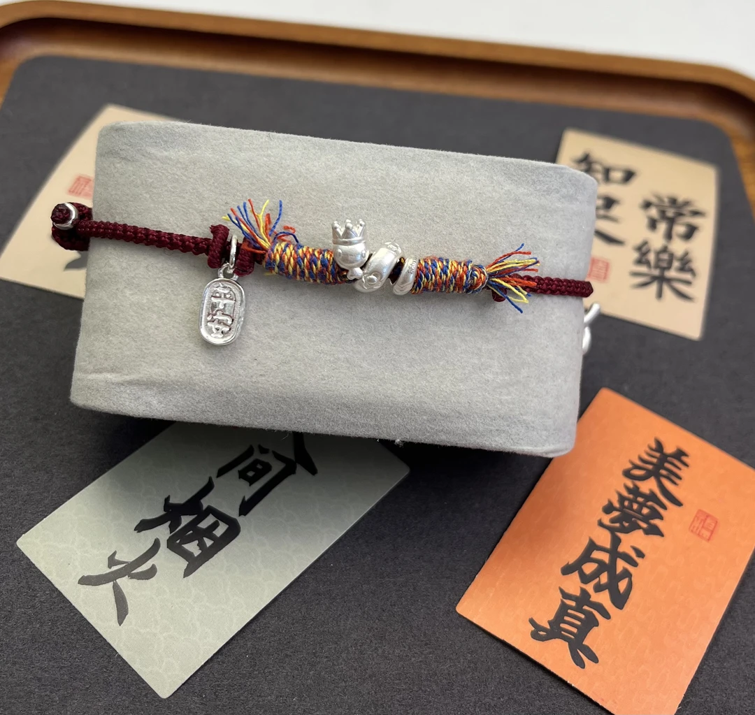 足银手链 足银手链足银999纯银卷卷蛇手工编织红绳本命年