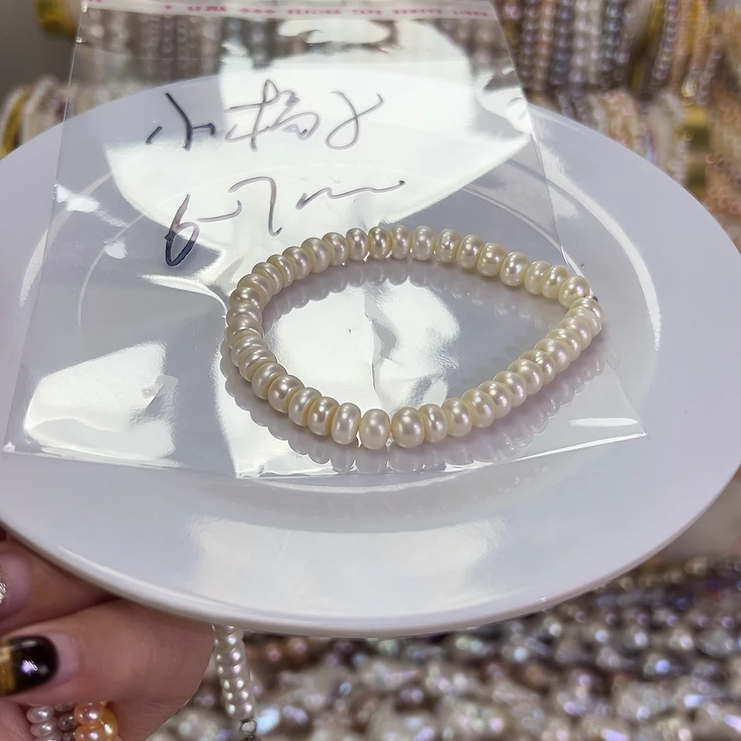 人***.钛钢淡水珍珠手绳
