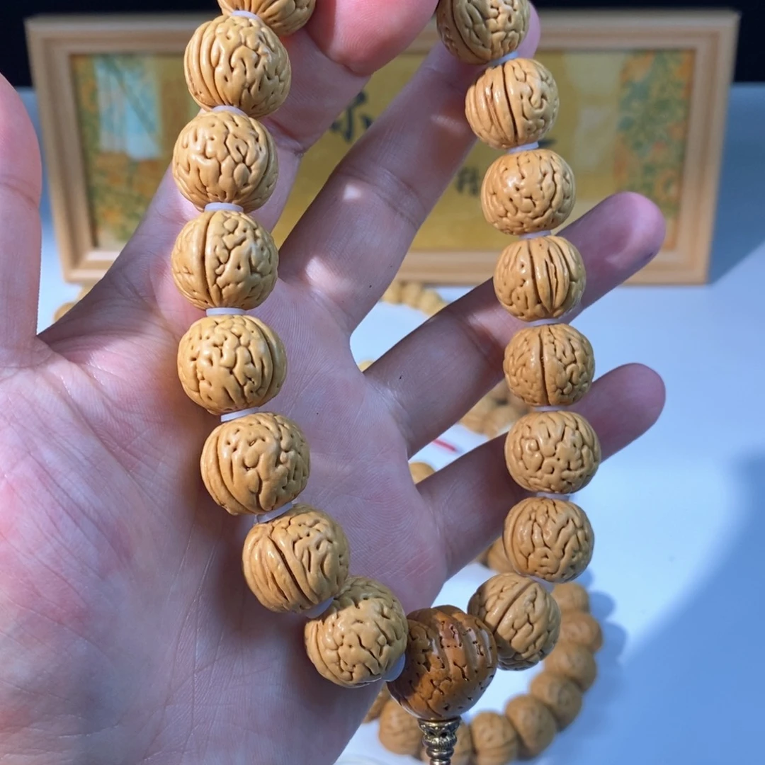 桃核手串隔**张盘锦野生大肌肉