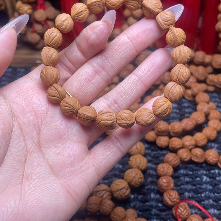 待***腰木质类龙纹桃枭手串