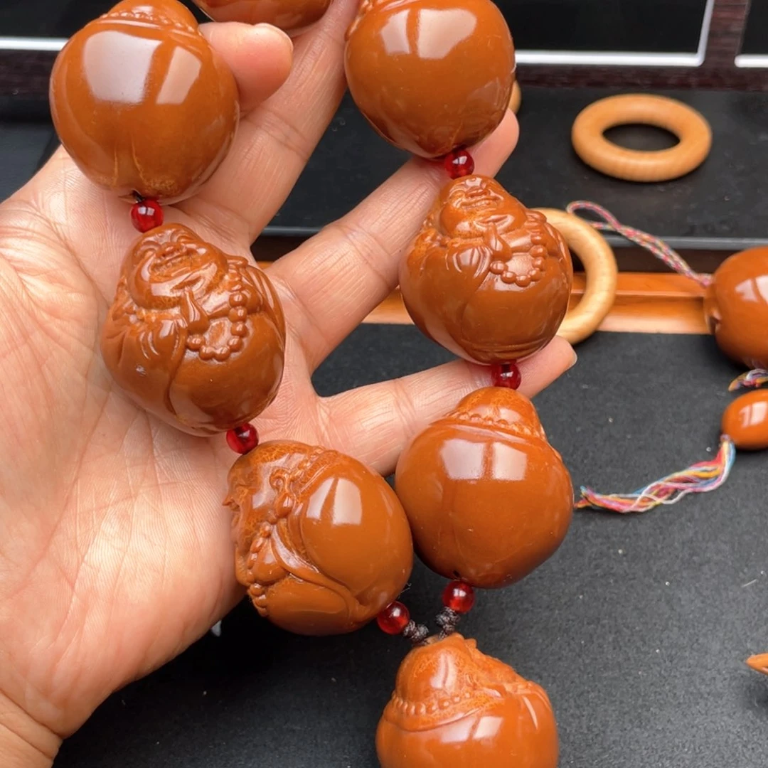 把件橄榄核弥勒手持