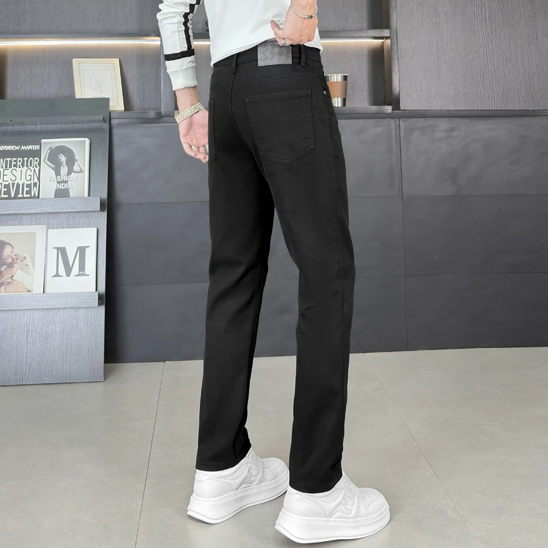 2025冬款加绒加厚纯黑色牛仔裤男款弹力修身小直筒百搭男士长裤子