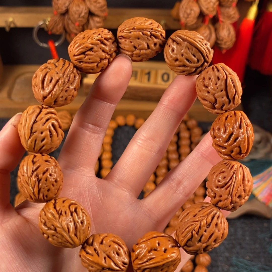 吊坠桃核桃枭手串