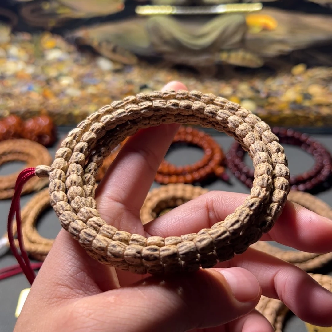 仁***山柏香籽/百香籽吊坠A8