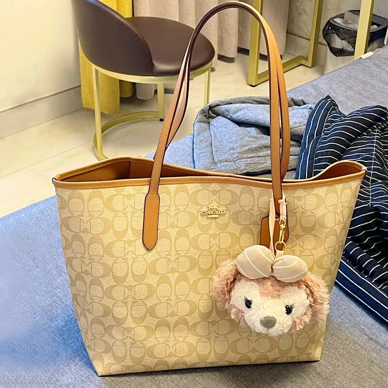 包包女士2025新款女包通勤中号托特包单肩秋冬帆布腋下包大容量女