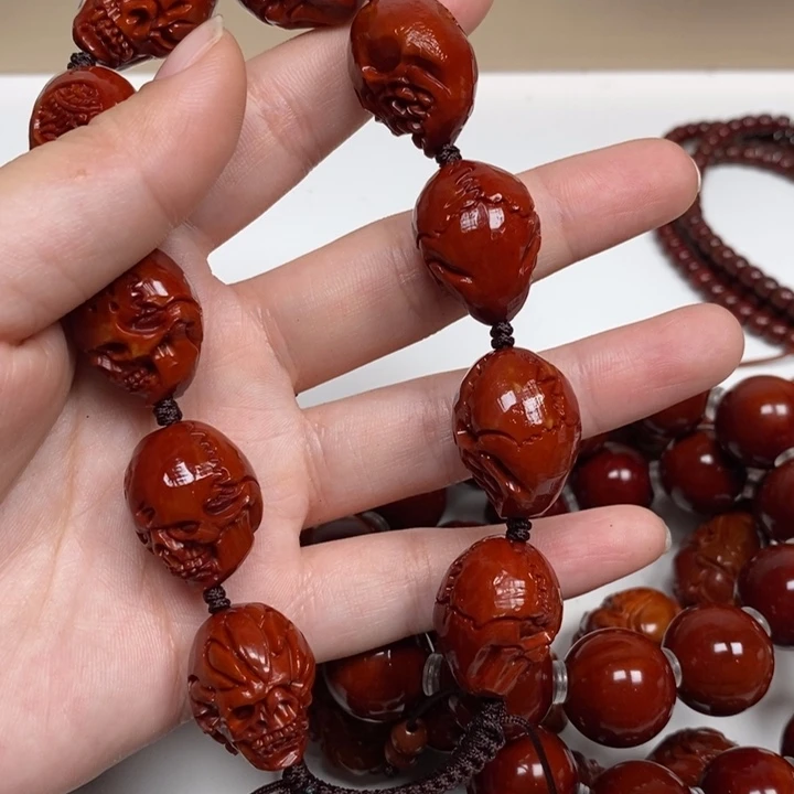 ****梦橄榄核雕刻工艺的发展