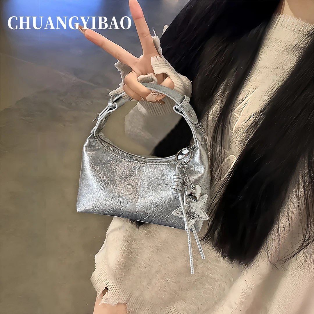 银色百搭通勤手提饺子包包女2025新款秋冬超火简约休闲单肩斜挎包