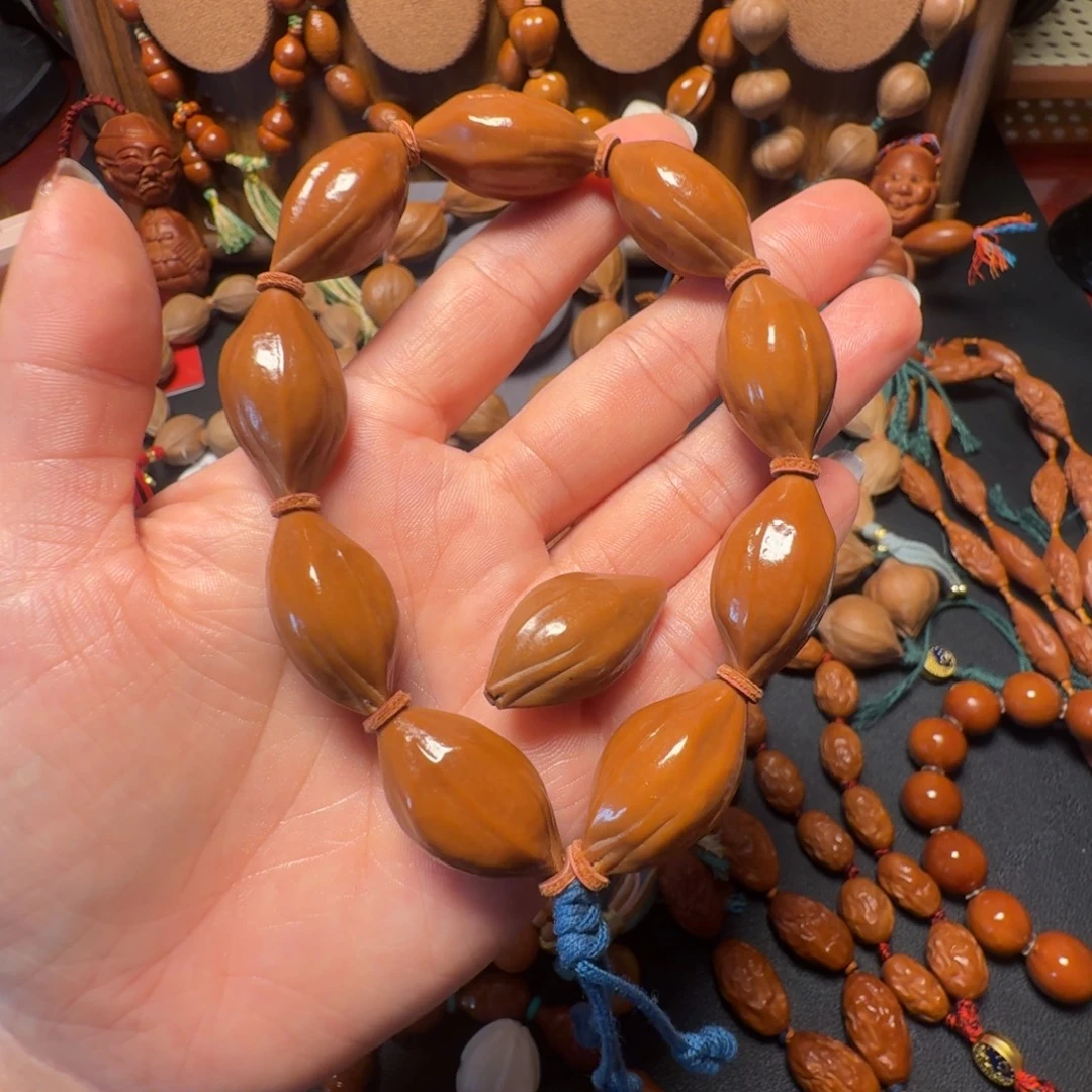 橄榄核手串/手链1.6左右鸡血红老油核原皮手持