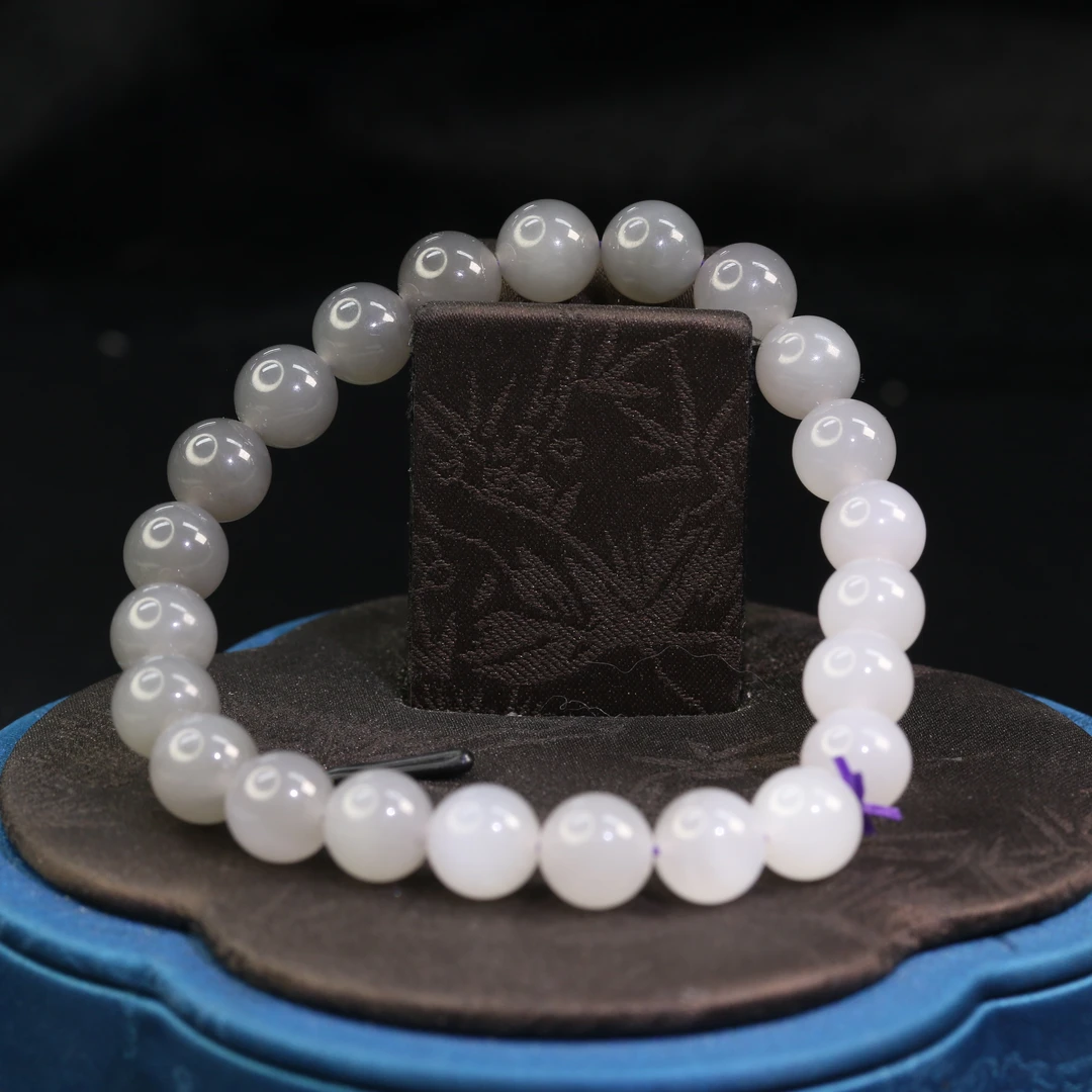 1和田玉烟紫渐变色手串/900565保利厦门拍卖